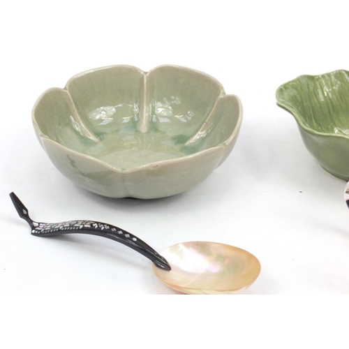 524 - Two Thai bowls, rice spoon and a silver plated four branch candlestand