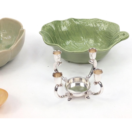 524 - Two Thai bowls, rice spoon and a silver plated four branch candlestand