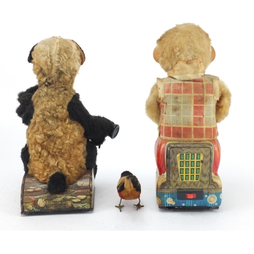 127 - Two battery operated bears and a clock work bird