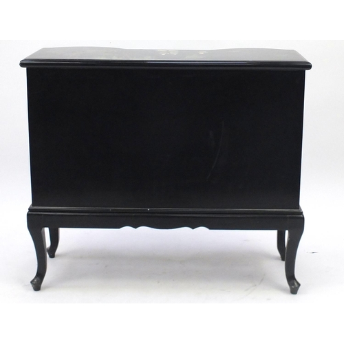 2026 - Oriental black lacquered side cabinet, hand painted in the Chinoiserie manner, fitted with a pair of... 