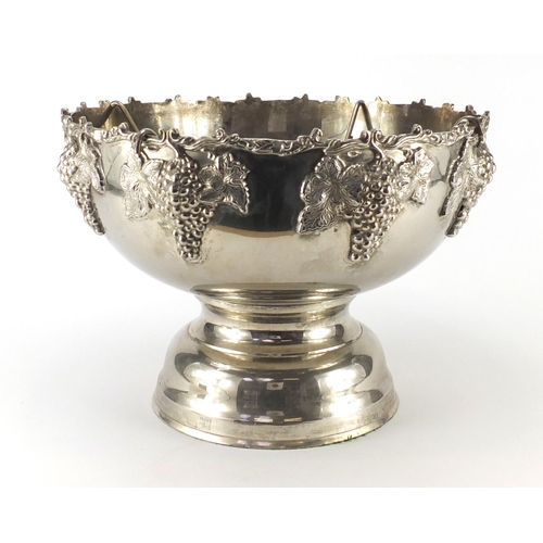 2051 - Large silver plated pedestal punch bowl, with leaf and berry design, 28cm high x 40cm in diameter