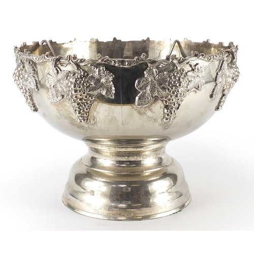 2051 - Large silver plated pedestal punch bowl, with leaf and berry design, 28cm high x 40cm in diameter