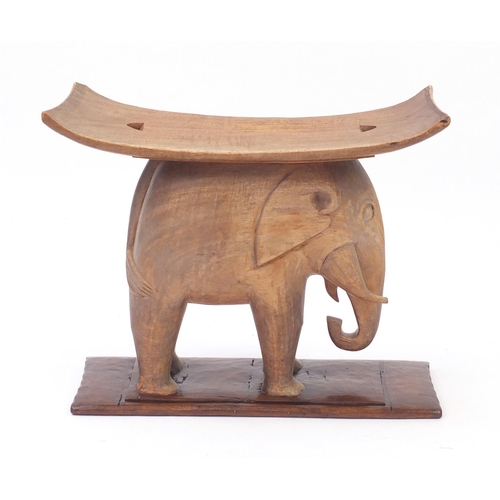 103 - Large African carved hardwood elephant seat, 51cm H x 61cm W x 29cm D