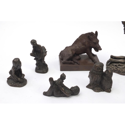 213 - Decorative bronze style figures including erotic couple, Egyptian cat and young children