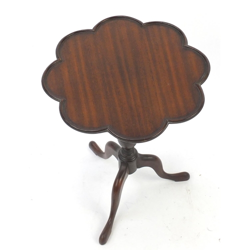 29 - Mahogany tripod occasional table, with shaped top, 55cm high