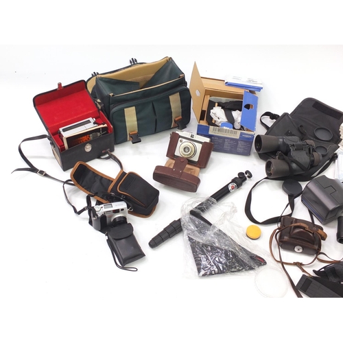 264 - Vintage cameras, lenses and accessories including Canon, Ilford, Paxette and Olympus