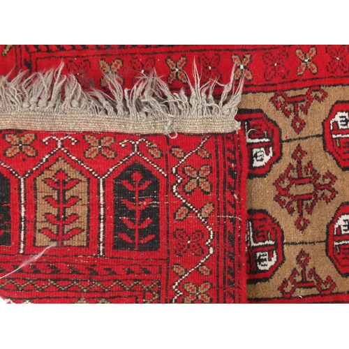 106 - Persian red ground prayer mat, with all over geometric design, 115cm x 80cm