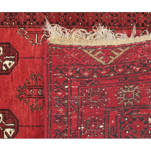 93 - Persian red ground prayer mat, with all over geometric design, 110cm x 78cm