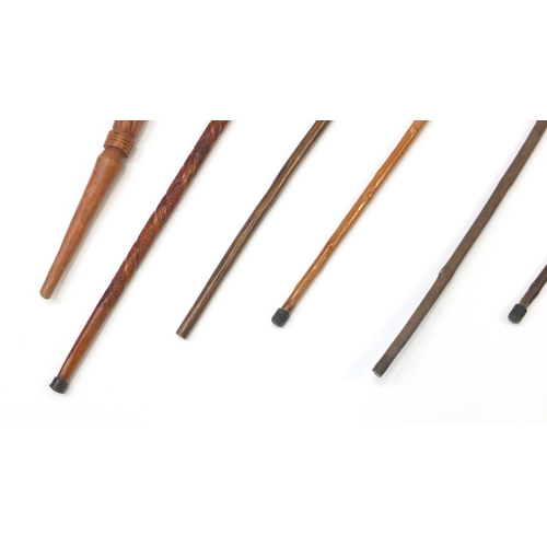 616 - Wooden walking sticks, some with animal head handles and horn handles