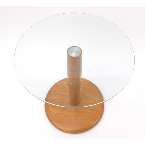 2014 - Ercol light elm occasional table with circular glass top, 62cm high x 60cm in diameter