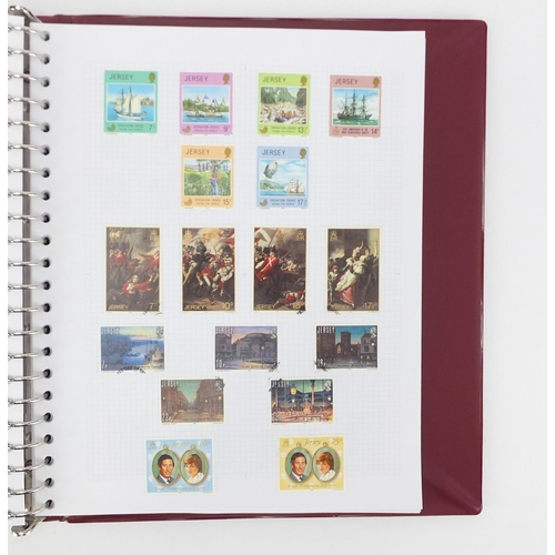 818 - Channel Island stamps arranged in an album