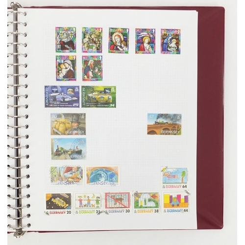 818 - Channel Island stamps arranged in an album