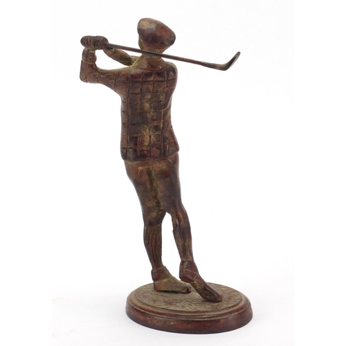 794 - Patinated figure of a golfer, 23cm high