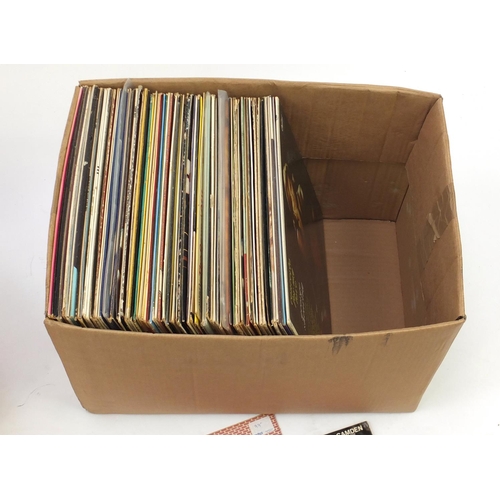 261 - Two boxes of vinyl LP's including Paula Abdul, promotional copy and Bad Boys