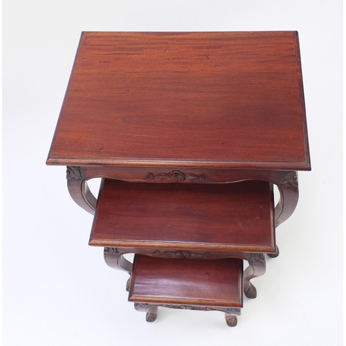 98 - Nest of three carved mahogany occasional tables, the largest 60cm H x 60cm W x 43cm D