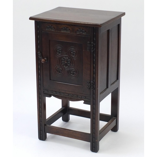 69 - Carved oak pedestal cupboard, 74cm H x 43cm W x 35cm D