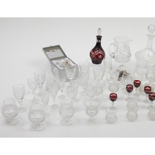 241 - Good quality cut crystal and glassware including Thistle glasses, decanters and jugs together with a... 