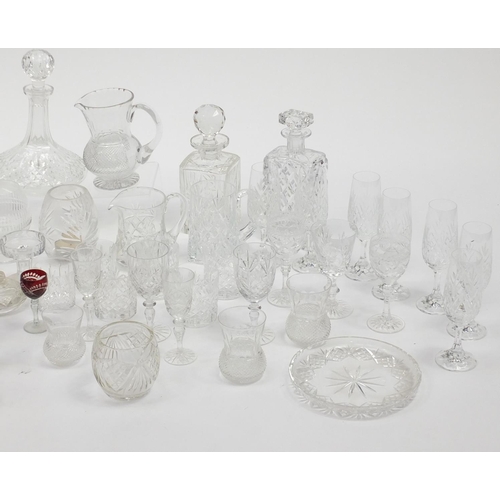 241 - Good quality cut crystal and glassware including Thistle glasses, decanters and jugs together with a... 