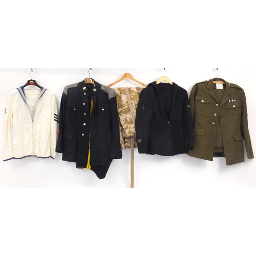 924 - Military clothing including tunics and camo trousers