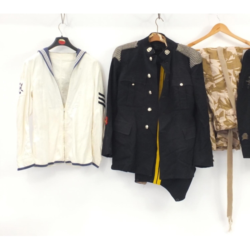 924 - Military clothing including tunics and camo trousers