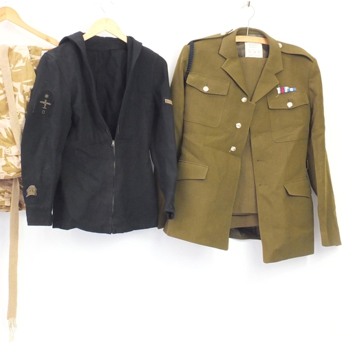 924 - Military clothing including tunics and camo trousers