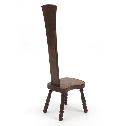 102 - Carved oak high back chair, 87cm high