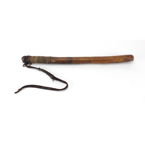 909 - Vintage turned wooden truncheon, with leather strap, 50cm in length