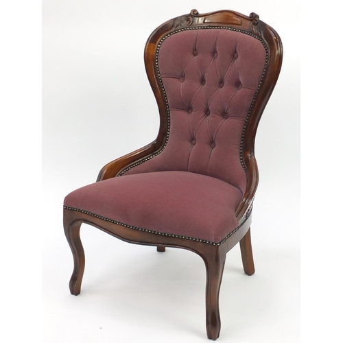 20 - Mahogany framed bedroom chair, with pink button back upholstery, 90cm high