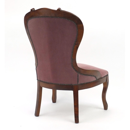 20 - Mahogany framed bedroom chair, with pink button back upholstery, 90cm high