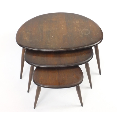 5 - Set of thee Ercol elm pebble occasional tables, the largest 40cm H x 65cm W x 45cm D