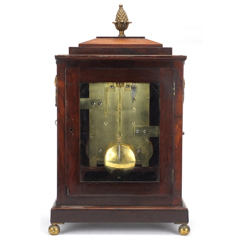 2047 - Regency rosewood bracket clock with brass inlay, fretwork panels and pineapple finial, the eight day... 