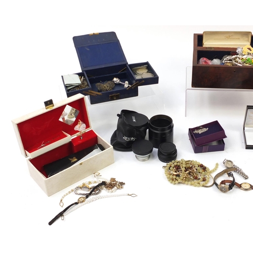 342 - Costume jewellery including simulated pearl necklaces and Simon Carter wristwatch, mostly housed in ... 