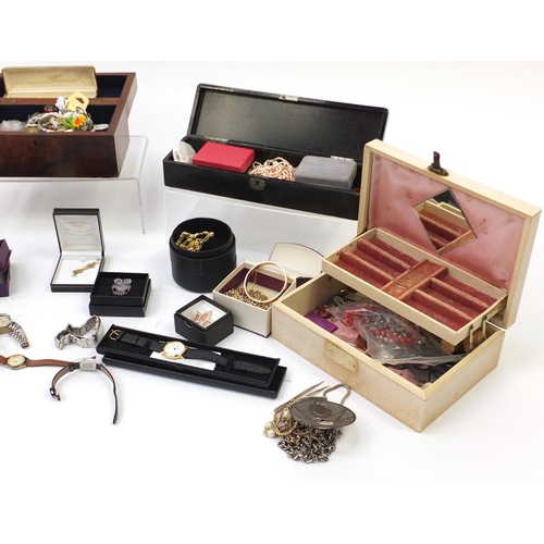 342 - Costume jewellery including simulated pearl necklaces and Simon Carter wristwatch, mostly housed in ... 