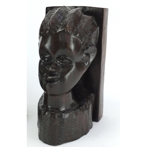 142 - African carved hardwood figure and pair of bookends