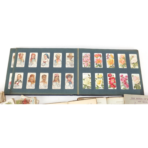 819 - Ephemera including cigarette cards and antique books