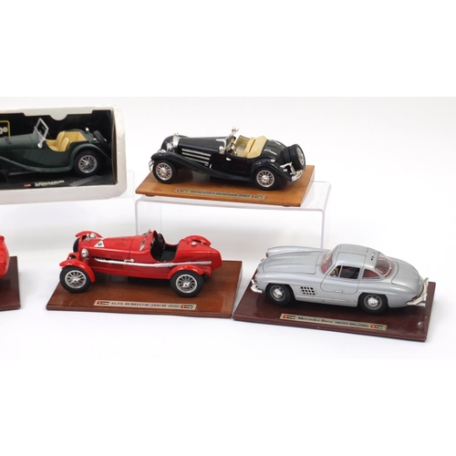 585 - Seven Burago die cast collectors vehicles