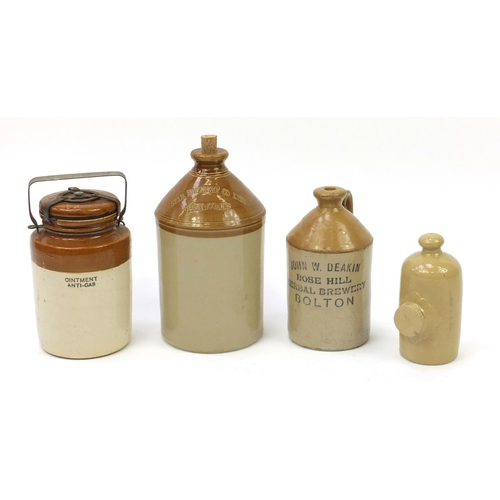 265 - Four stoneware bottles including Star Brewery Eastbourne, the largest 33cm high