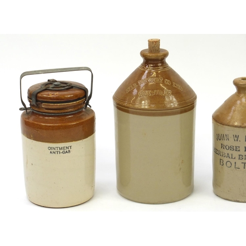 265 - Four stoneware bottles including Star Brewery Eastbourne, the largest 33cm high