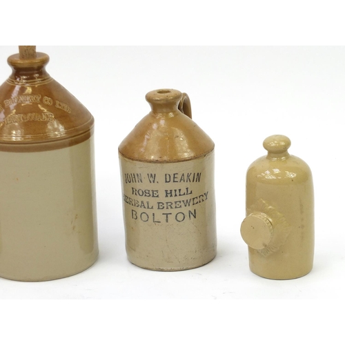 265 - Four stoneware bottles including Star Brewery Eastbourne, the largest 33cm high