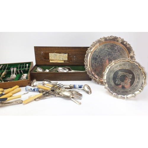 212 - Silver plated items including cutlery, some with ivory handles, three footed salver, toast rack and ... 