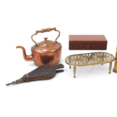 218 - Metal and woodenwares including copper kettles, fire bellows, trivet and shell case