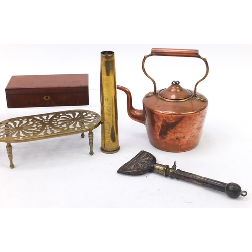 218 - Metal and woodenwares including copper kettles, fire bellows, trivet and shell case