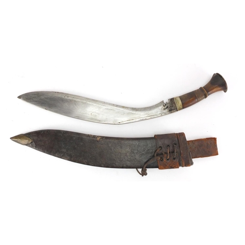 911 - Kukri knife with carved wooden handle and leather sheath, 50cm in length