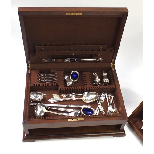 219 - Art Deco mahogany canteen, with a selection of silver plated cutlery and cruets