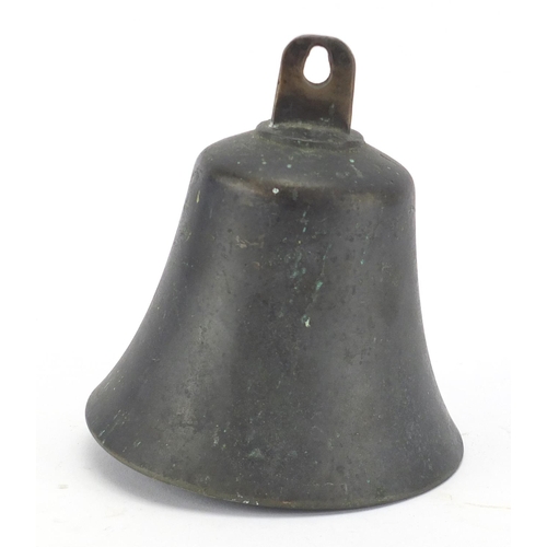 551 - Bronze bell, marked R.W to the inside, 12.5cm high