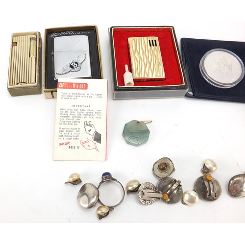 457 - Objects including Zippo lighter, Festival of Britain 1951 Crown, Geneve automatic wristwatch and a s... 