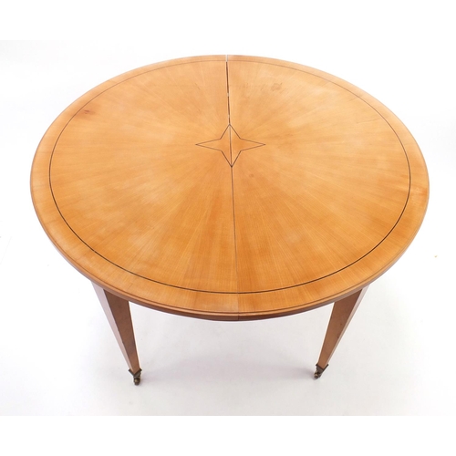 50 - Inlaid light wood circular dining table, 80cm high x 110cm in diameter