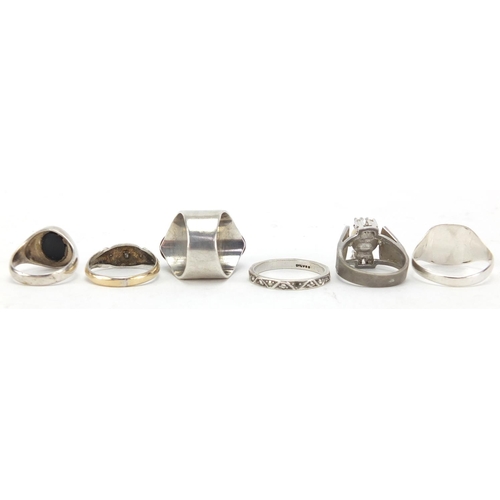 294 - Six silver and white metal rings, set with assorted stones, various sizes, approximate weight 24.0g