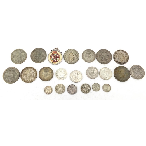 631 - Mostly British pre decimal coins, half crowns, half shillings and an enamelled one florin