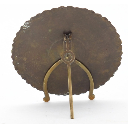 406 - Brass perpetual desk calendar, with enamelled numbers, 14cm in diameter